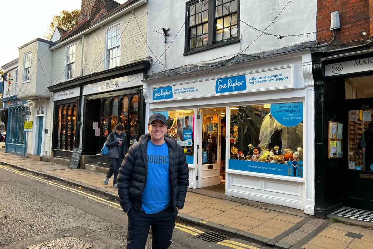 me outside Sue Ryder Charity Shop