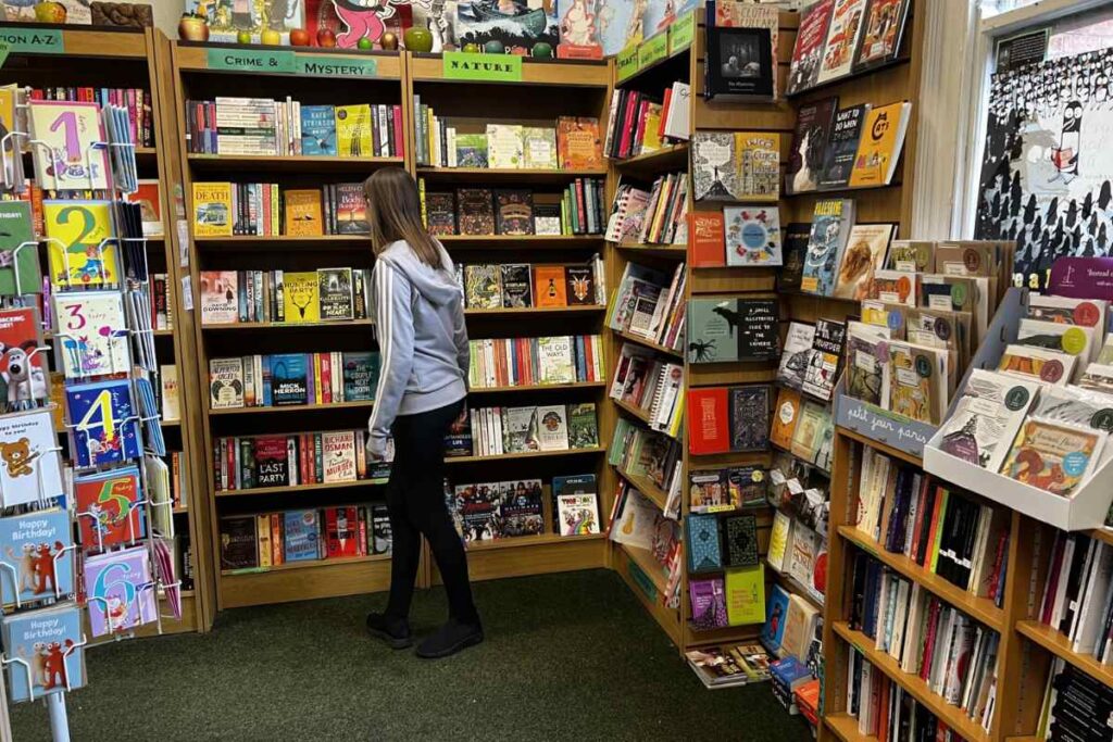 Book Shelves Near Counter the Little Apple Bookshop